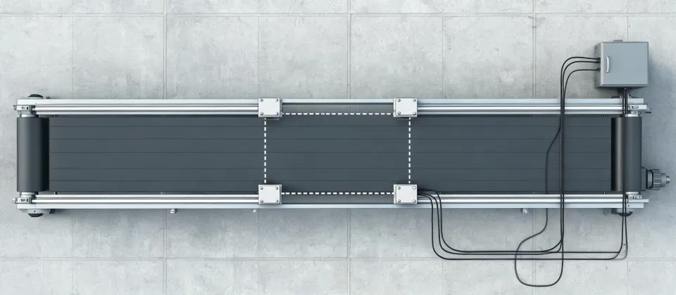 Schematic of a conveyor transfer cell with photo-eyes, side guides and a control cabinet